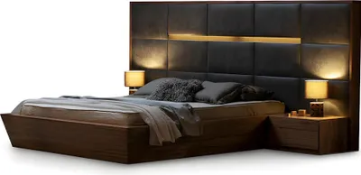 Produktbild von Das hohe, schicke Bett ist mit eleganten Textilien ausgestattet.