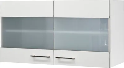A white kitchen cabinet with frosted glass doors and two drawers.