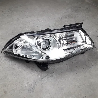 Obrázek produktu pro Pravý světlomet Renault Megane 2 Facelift, fáze 2, s lupou a elektrickým nastavováním | 2005-2008