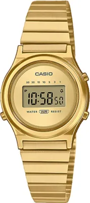 A close-up, front-facing studio shot of a gold Casio digital watch against a white background.