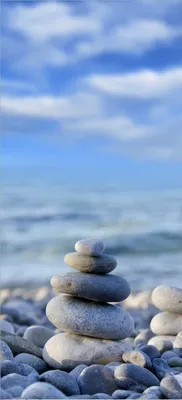 Produktbild von Türtapete Türposter Steinstapel am Strand - Größe: 93 x 205 cm