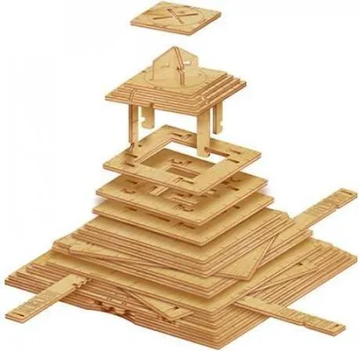 A disassembled wooden puzzle in the shape of a pyramid.