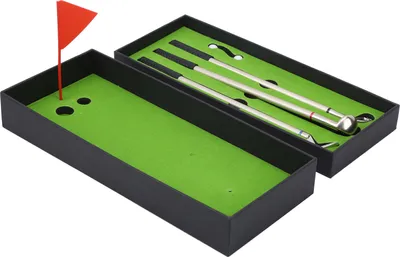 A golf pen set is displayed in its packaging, which resembles a mini golf course.