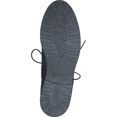 The sole of a black boot is shown against a white background.