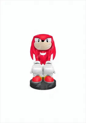 A figurine of the character Knuckles from Sonic the Hedgehog, standing on a black base.