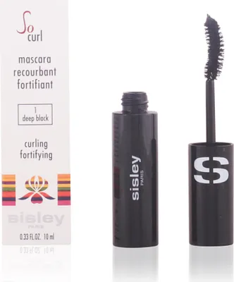A product shot of a mascara tube and its packaging, displayed with the wand separate from the tube.