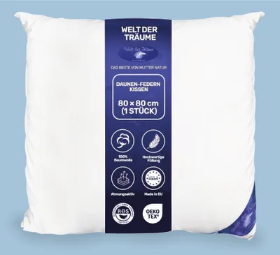A white pillow with a blue label detailing product information.