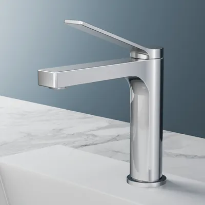 A chrome faucet is shown on a white sink with a marble countertop.
