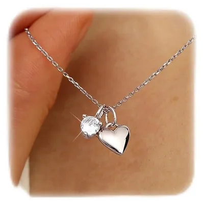 Produktbild von Damenkette aus 925er Silber mit Herz- und Münzanhänger