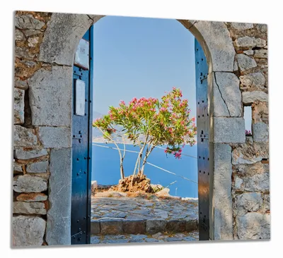 Produktbild von Wallario Herdabdeckplatte aus Glas, Größe 60 x 52 cm 1-teilig, Motiv Torbogen Toskana