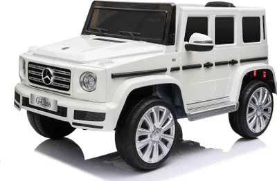 Immagine prodotto di Auto elettrica Mercedes G500 12V, bianca, telecomando 2,4 GHz, ingresso USB/SD, sospensione ruote posteriori, batteria al litio, luci LED, licenza ORIGINALE