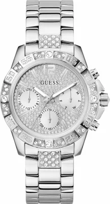 A close-up, studio shot of a silver Guess watch with a diamond-encrusted face and bezel.