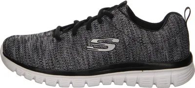 Side view of a single Skechers shoe.