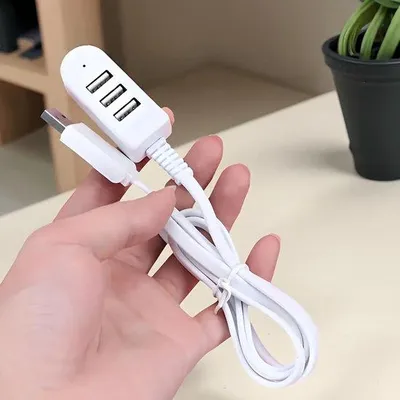 Produktbild von 3-in-1 USB-Adapter mit Ladefunktion, Datenübertragung, Nachtlicht und Mini-Ventilator; für eine Vielzahl von USB-Geräten geeignet.