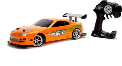 A remote-controlled car and its controller are displayed on a white background.