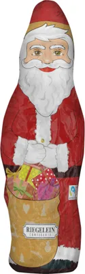 A full-body image of a chocolate Santa Claus figure holding a sack of gifts.