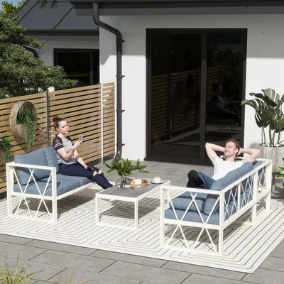 Image de Ensemble de jardin modulaire comprenant un coin salon, deux canapés, une table, des coussins, et une finition grise