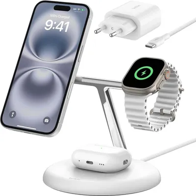 A white charging station with an iPhone, Apple Watch, and AirPods charging.