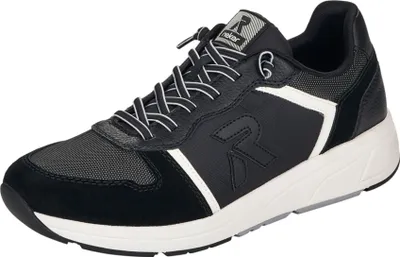 A studio shot of a black sneaker with white accents.