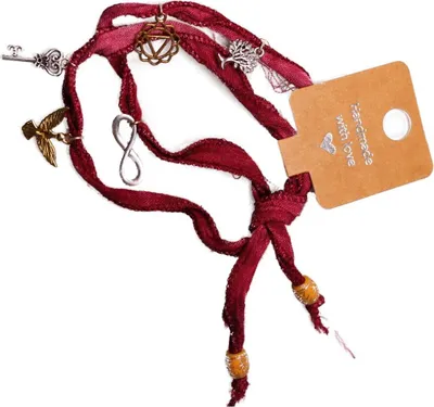 Produktbild von MerryDesign Arm-/Fußband Rotes Stoffband mit Charmanhänger