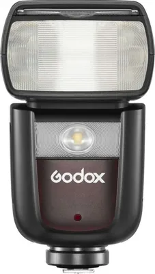 A studio shot of a camera flash unit.