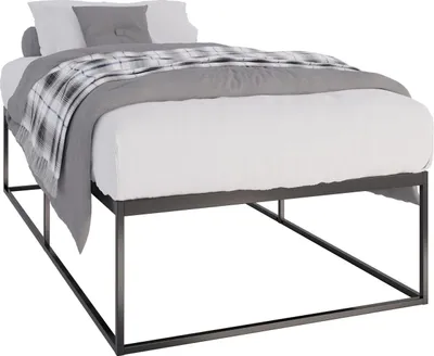 A bed frame with bedding.
