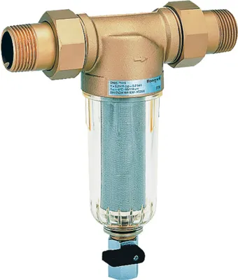 A brass and clear plastic water filter with a mesh filter element and a black handle valve.