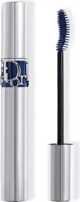 A silver tube of Dior Diorshow Iconic Overcurl mascara with the wand extended, showing the blue mascara and black brush.