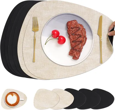 Produktbild von Tischsets aus Kunstleder und Untersetzer, abwaschbare, doppelseitige, rutschfeste Platzsets in runder Lederoptik (6er Set, Cremeweiß Schwarz)