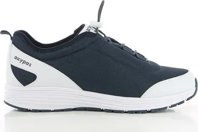 A side view of a navy and white athletic shoe.