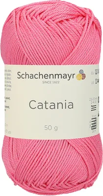 A ball of pink yarn with a label.