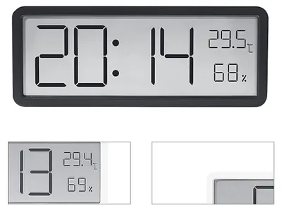 A digital clock and thermometer displaying time, temperature, and humidity.