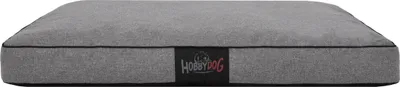 A gray dog bed is shown from the front.