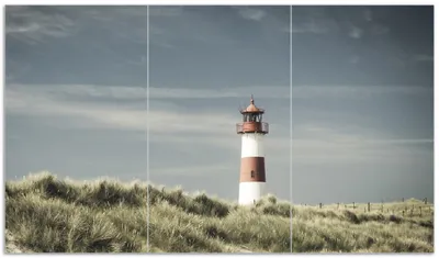 Produktbild von Wallario Herdabdeckplatte aus Glas, Größe 90 x 52 cm 3-teilig, Motiv Leuchtturm auf der Düne am Strand