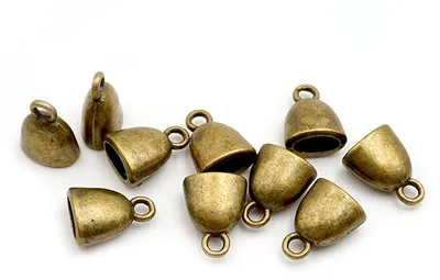 Produktbild von Vintageparts 10 Endkappen antik Bronze, oval, für 7 x 3 mm Bänder