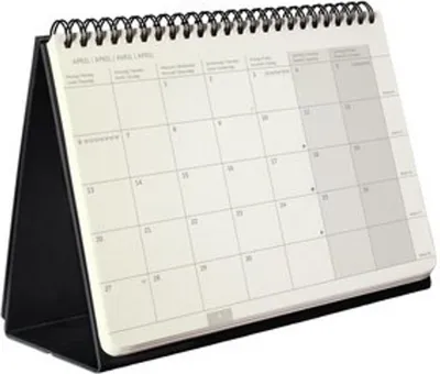 A desk calendar with a black stand.