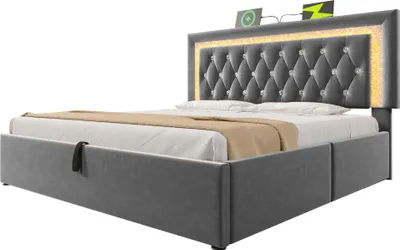 A modern upholstered bed with LED lighting and charging ports.