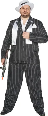 A man wearing a gangster costume.