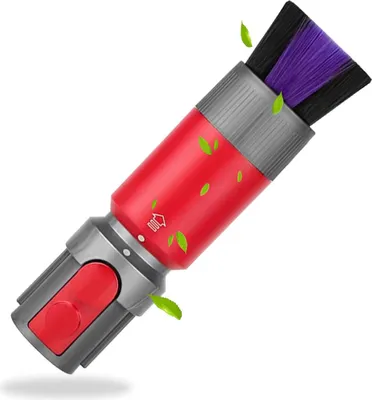 A red and gray vacuum cleaner attachment with purple and black bristles against a white background, with small green leaf graphics scattered around.