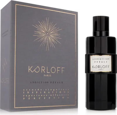 A perfume bottle and its box are displayed side-by-side against a white background.