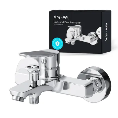A chrome bathtub faucet is shown in the foreground, with its packaging in the background.