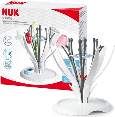 A NUK Multi Dry bottle and accessory drying rack is shown in front of its packaging.