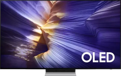 A television screen displaying a colorful abstract image, with the word "OLED" in white text on the bottom right.