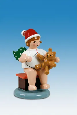 Produktbild von Holzfigur Engel mit Teddy und Mütze Höhe 6cm NEU