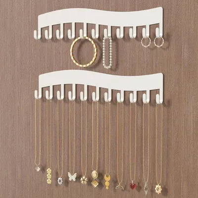 Produktbild von Unyqoos® Schmuck-Wandhalter aus Metall mit selbstklebendem Aufhängesystem – platzsparender Organizer für Ketten, Armbänder & Ohrringe