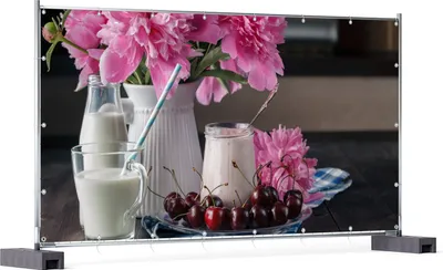 Produktbild von Wallario XXL Outdoor-Poster für Garten oder Balkon, Motiv Milch mit Kirschen zum Frühstück mit rosa Blumenarrangement, in ca. 340 x 173 cm
