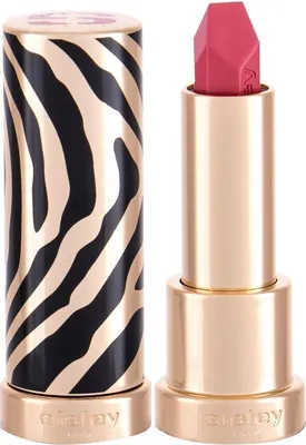 A close-up studio shot of a lipstick with a zebra print case.