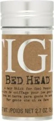 A close-up shot of a Tigi Bed Head styling product.