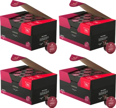 Four open boxes of coffee capsules, each containing multiple rows of capsules.