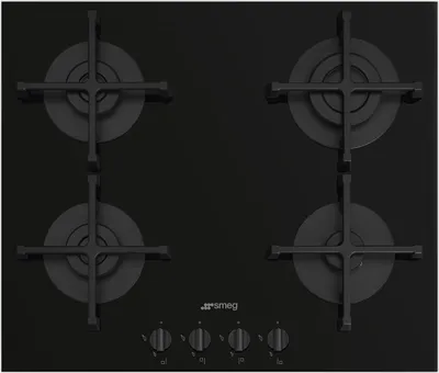 A top-down view of a black gas stovetop with four burners and control knobs at the bottom.